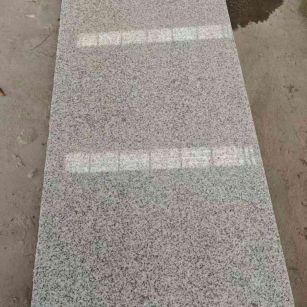 淄博芝麻白光面毛板